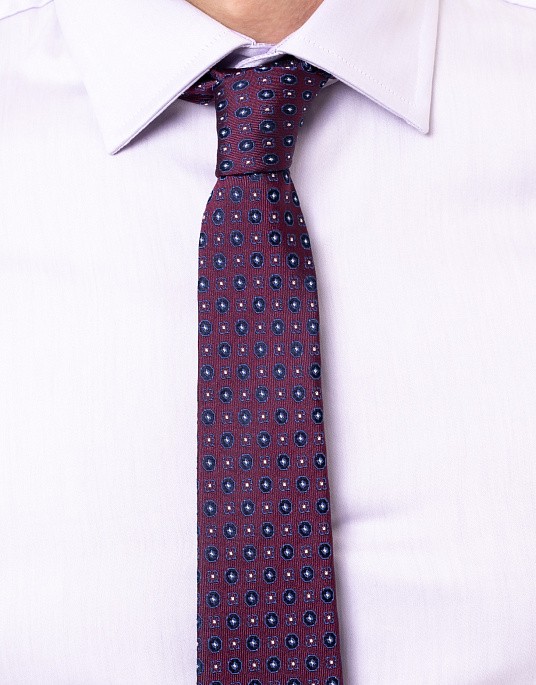 Pierre Cardin tie in a burgundy shade with a print